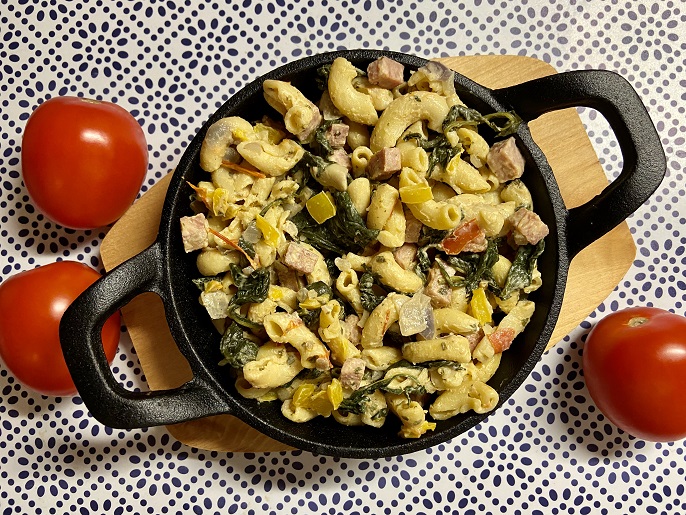 Macaroni met spinazie, tomaten en ham
