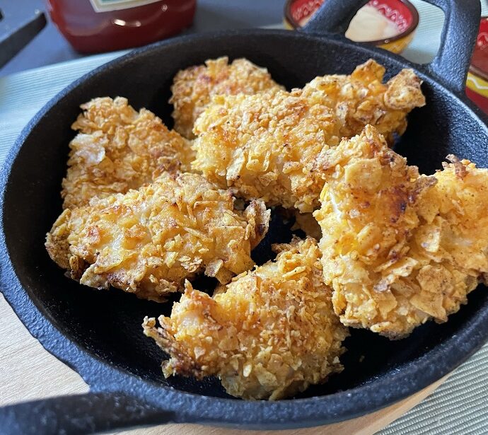 Kipnuggets met Doritos uit de oven